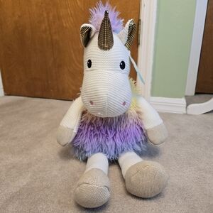Hug Me brand unicorn, which is perfect because it looks very huggable!